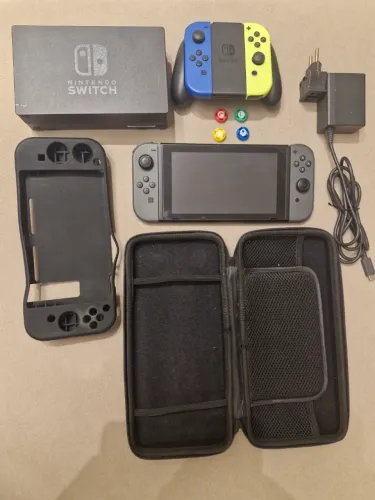 Nintendo Switch V1 Unpatched XAW1 + 4 Joy-Cons + Caixa + Dock