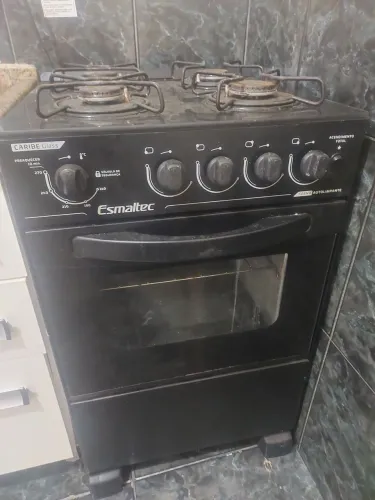 Fogão esmaltec 4 bocas semi novo acompanha registro mangueira e gaz pela metade