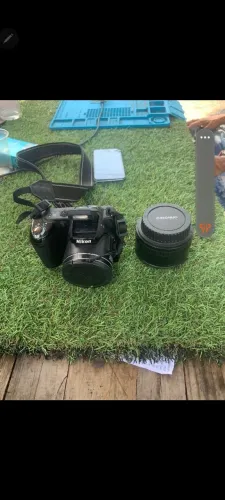 vendo camera digital nikon e uma lente da canon 50m