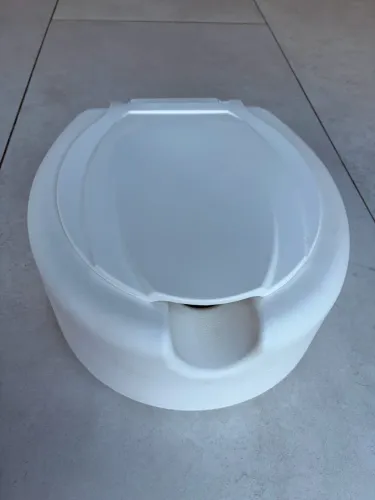 Assento de elevação para sanitário