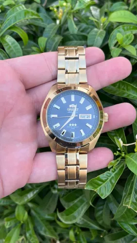 Relógio orient automático Dourado - tamanho 44mm