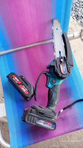 Moto serra duas baterias uma de 96v e outra de 48,troco por makita