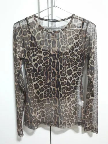 Blusa manga longa onça transparente com top preto