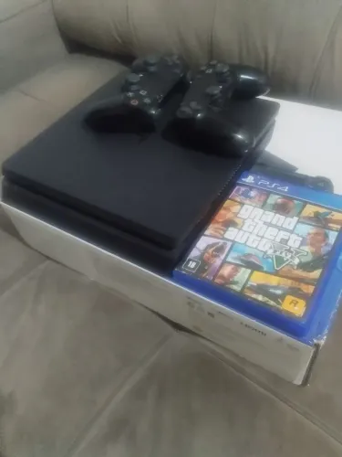 Ps4 slim 1 terá 2 controles 1 jogo GTA 5 vídeo game muito novo acompanha caixa