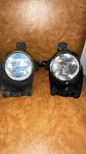 Par de farol de milha Gm onix mais quebra sol lado do carona