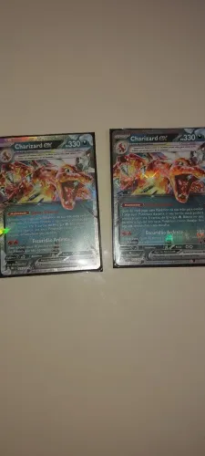 PAR DE CARTAS CHARIZARD tera EX COM ERRO!! NA TRASEIRA *erro raro!! /misscut/inverted back