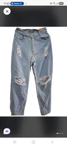 Calça jeans cintura alta destroyed azul claro