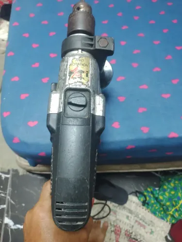 Vendo ou negócio essa furadeira de em paquito 200 reais