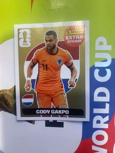 Extra Sticker Legend Ouro ( Gold) do jogador Cody Gakpo