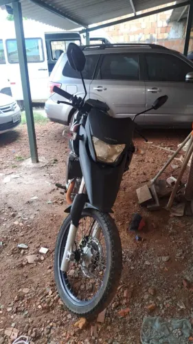 Ótima XRE único dono pra vender