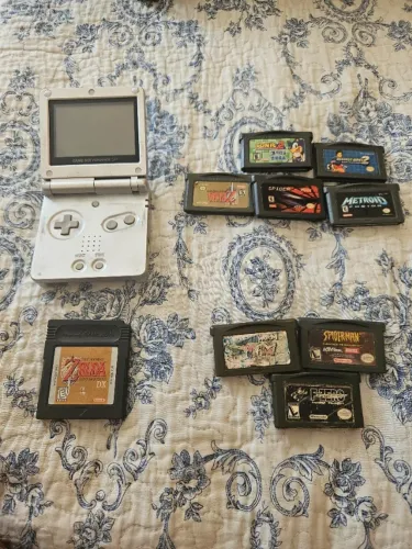 Gba sp + carregador + zelda links awakening + spiderman