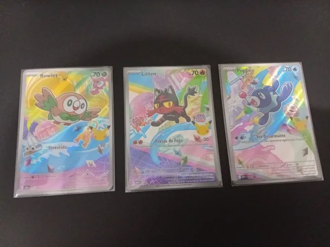 Cartas Pokémon: Rowlet, Litten e Popplio - NM - Adesivos e Código ( Valor abaixo da Liga )