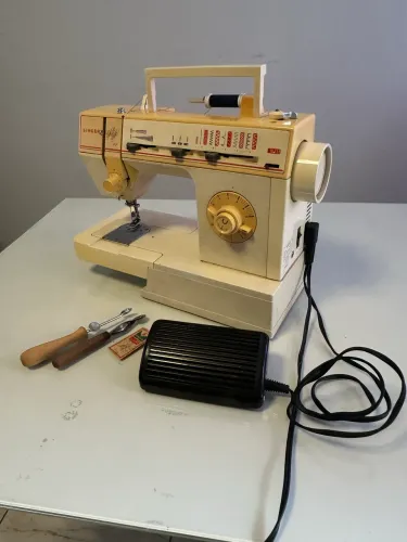Máquina de Costura Singer Prêt à Porter 11