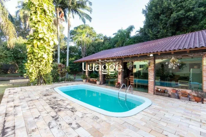 Casa para Locação/Aluguel - 292.21m², 4 dormitórios, sendo 2 suites, 3 vagas - T