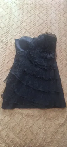 ?Vestido preto em perfeito estado?