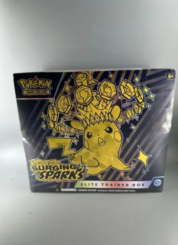 ETB- Surging Sparks Inglês Lacrada Pokémon