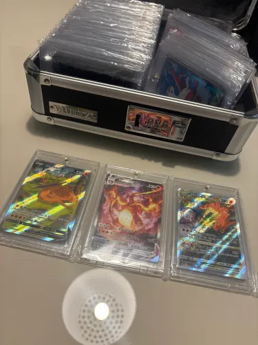 Trio Charizard americano! NM