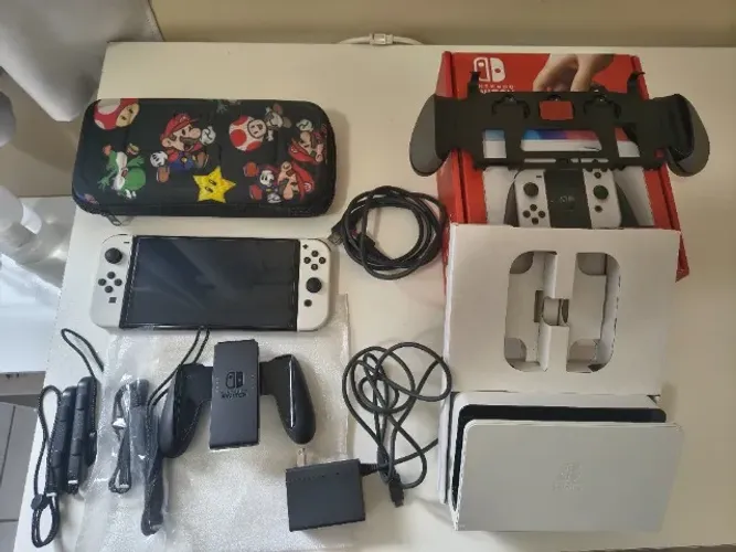 Nintendo Switch OLED importado, kit original completo + extra, com caixa e pouquíssimo uso