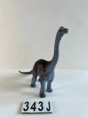 Dinossauro 27 cm de altura , 37 de comprimento borracha macia 