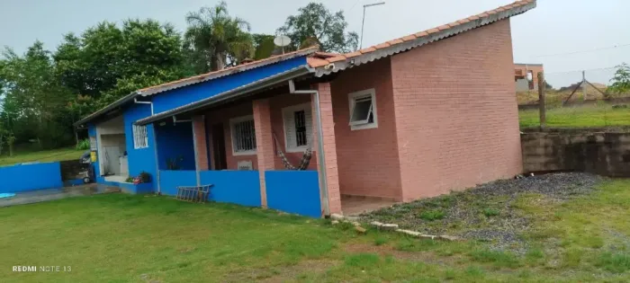 Chácara c/ 1100 m² em Piedade a 7 min. do centro e 50 m da pista. Pomar produzindo.