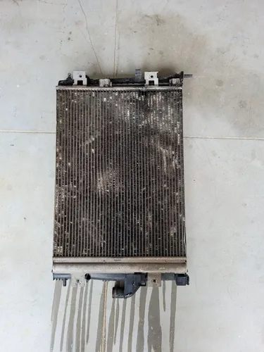Radiador e condensador Renault Duster 16v 2011 2012 2013 2014 Original