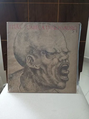 Disco de vinil titas cabeça dinossauro 