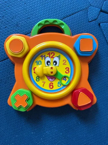 Vendo brinquedo Relógio divertido.