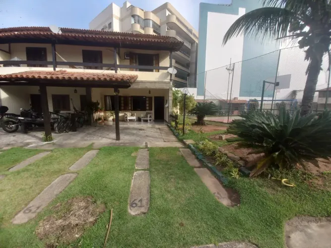 Casa à venda em Condomínio na Praia Grande com 04 quartos.