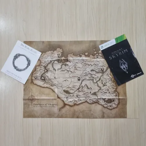 POSTER + MANUAL + ADESIVO EXCLUSIVO DO JOGO SKYRIM - XBOX 360 - COMPLETE E VALORIZE O GAME