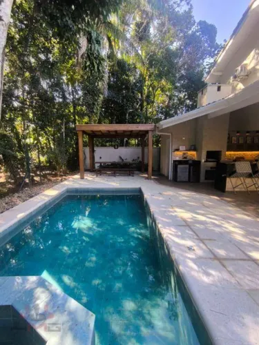 Casa com 4 dormitórios à venda, 226 m² por R$ 4.000.000,00 - Riviera Módulo 18 - Bertioga/