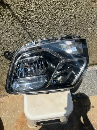 Vendo farol da duster lado do motorista ?lado esquerdo? 
