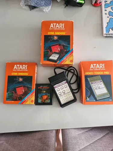Cartucho raro atari com os acessórios na caixa