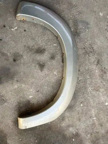 Alongador roda traseira direito Hilux original 61681-0k160