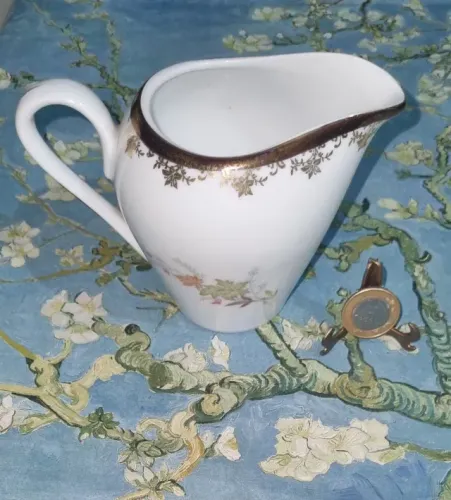 Leiteira ou cremeira de porcelana. 11cm. S.Paulo