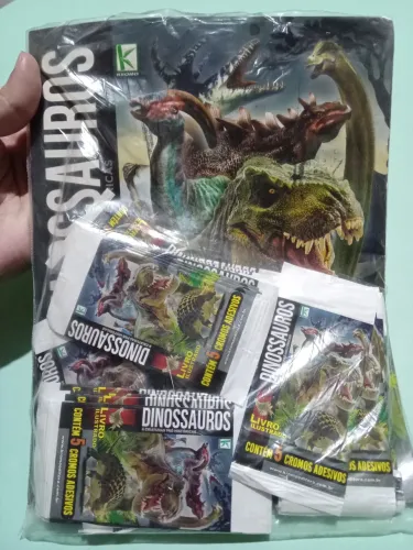 Livro Ilustrado álbum Dinossauros criaturas pré históricas com mais de vinte pacotes