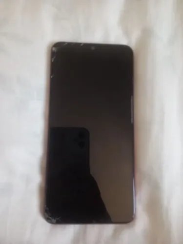 vendo um celular a010s tela quebrada mas funciona perfeitamente tá sem o botão do lado