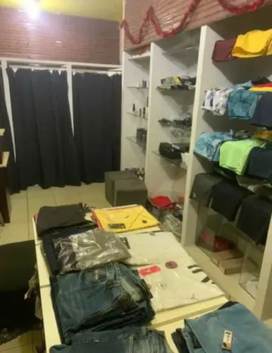 Vendo loja de roupas " aceito moto "