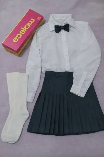 Uniforme Carmela Dutra