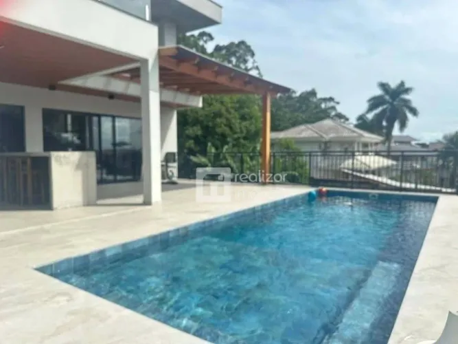 Casa Residencial à venda, Cacupé, Florianópolis - CA0562.