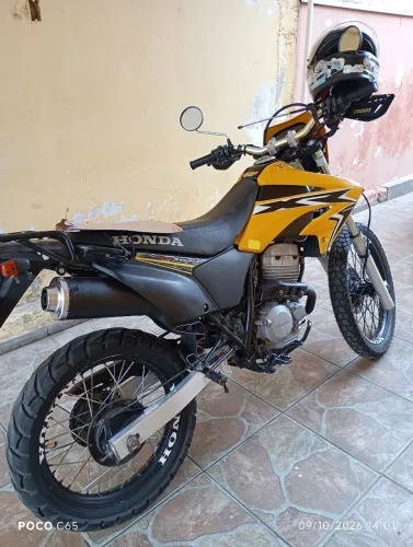 vende se moto Honda tornado bem conservada linda valor 13 mil