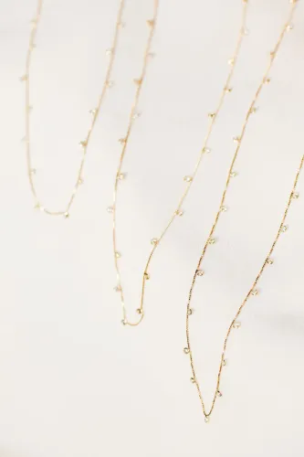 Cordão de ouro 18k com bolinhas em zirconias
