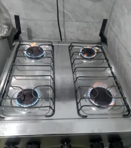 Fogão 4 Bocas Inox com Vidro do Forno Espelhado e Mesa Inox Atlas Mônaco Plus 