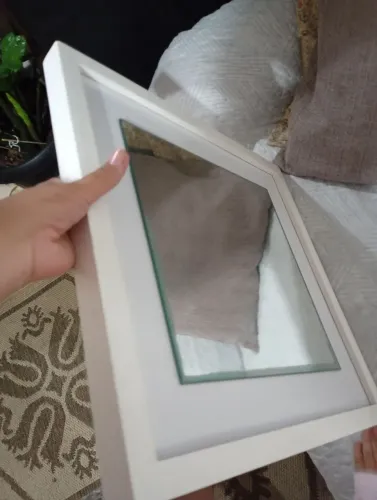 Espelhos na moldura