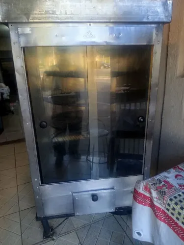 Máquina de frango giratória