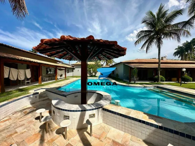 Casa com terreno de 1.600 à venda em Condomínio Jardim Acapulco no Guarujá | Omega Imóveis