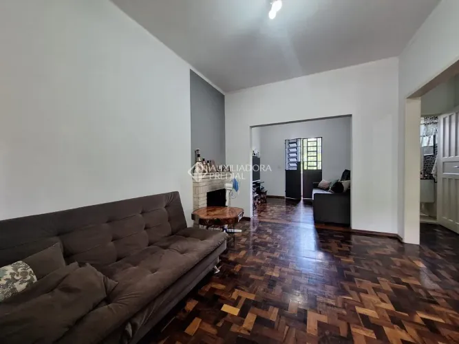 Casa 3 dormitórios, gabinete, lavanderia, lareira,sacada, sala de estar e jantar e terrenã