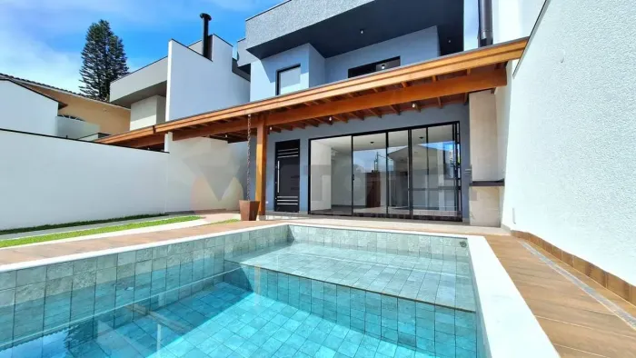 Sobrado com 4 quartos, 172 m², à venda por R$ 1.650.000 - Capricórnio I - Caraguatatuba/SP
