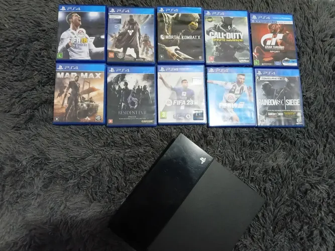 Ps4 fat (500 gigabytes) + 10 jogos físicos (sem os controles) 
