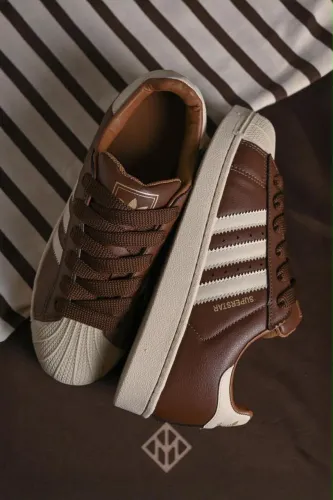 Tenis marrom feminino