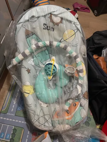 Cadeirinha musical de balanço